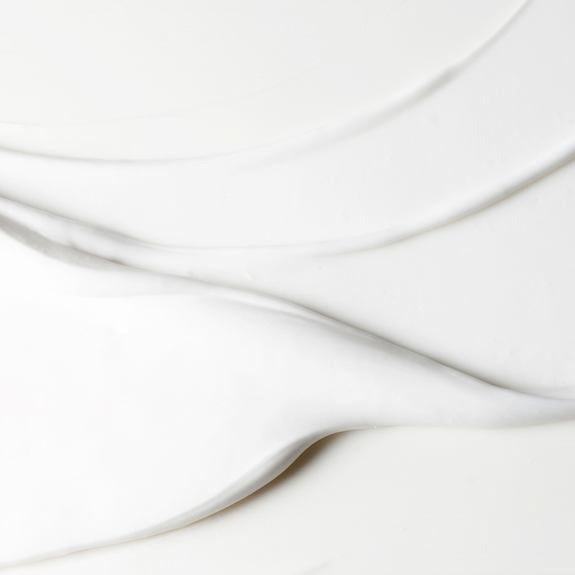 Crema bianca con texture liscia e sinuosa