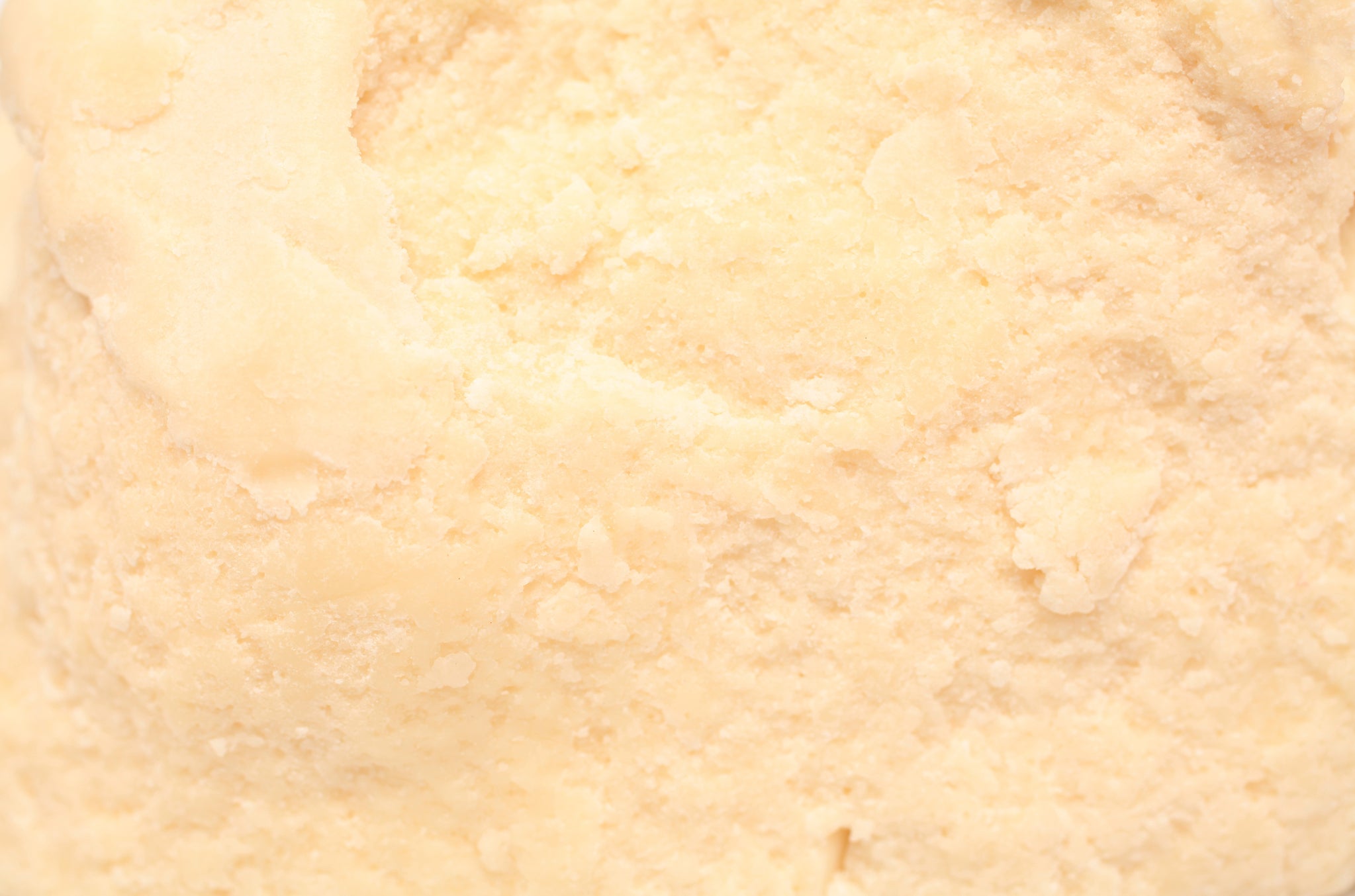 Primo piano di texture cremosa, leggermente granulosa